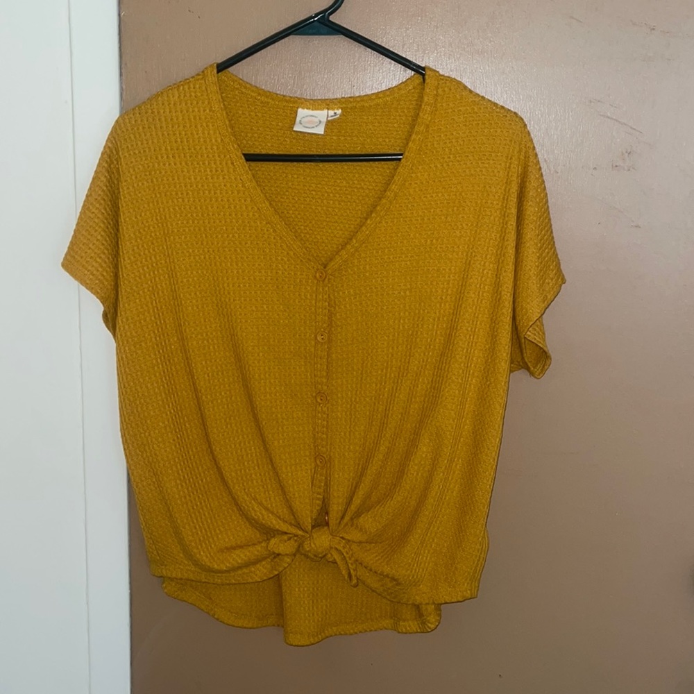 Yellow short sleeves button down shirt